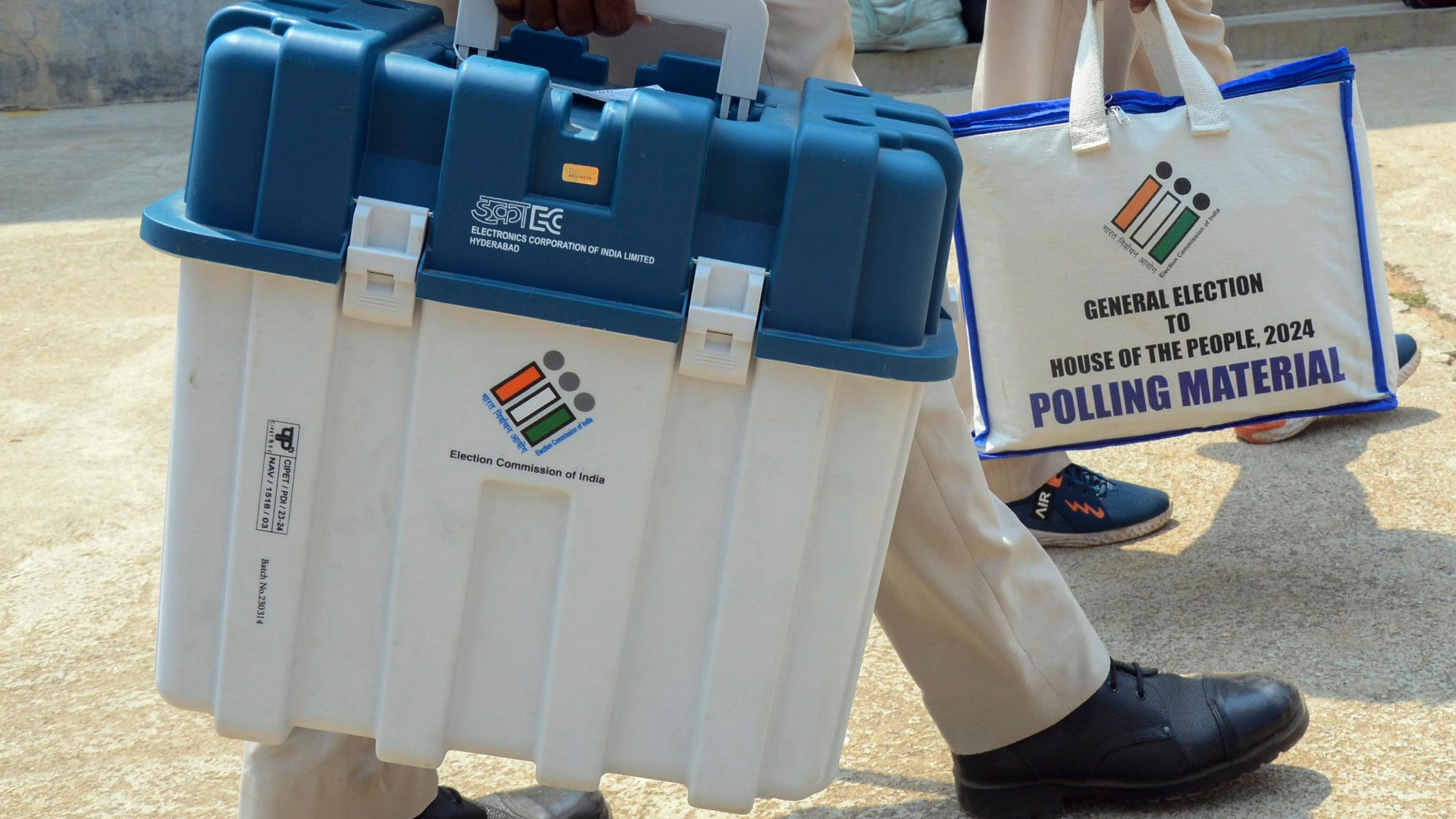 <div class="paragraphs"><p> Polling officials with EVMs and other election materials. Representative image.</p></div>