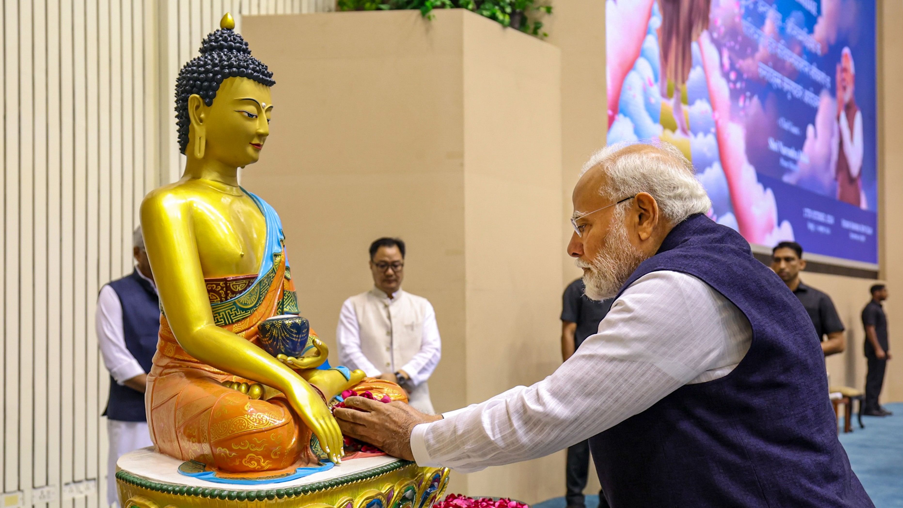 <div class="paragraphs"><p>Prime Minister Narendra Modi pays obeisance to Gautam Buddha during the International Abhidhamma Divas programme, in New Delhi, Thursday, Oct 17, 2024. </p></div>