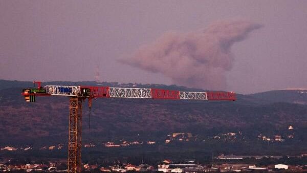 <div class="paragraphs"><p>Smoke rises after an Israeli Air Force air strike in southern Lebanon village, amid cross-border hostilities between Hezbollah and Israel, as seen from as seen from Nahariya, northern Israel.</p></div>