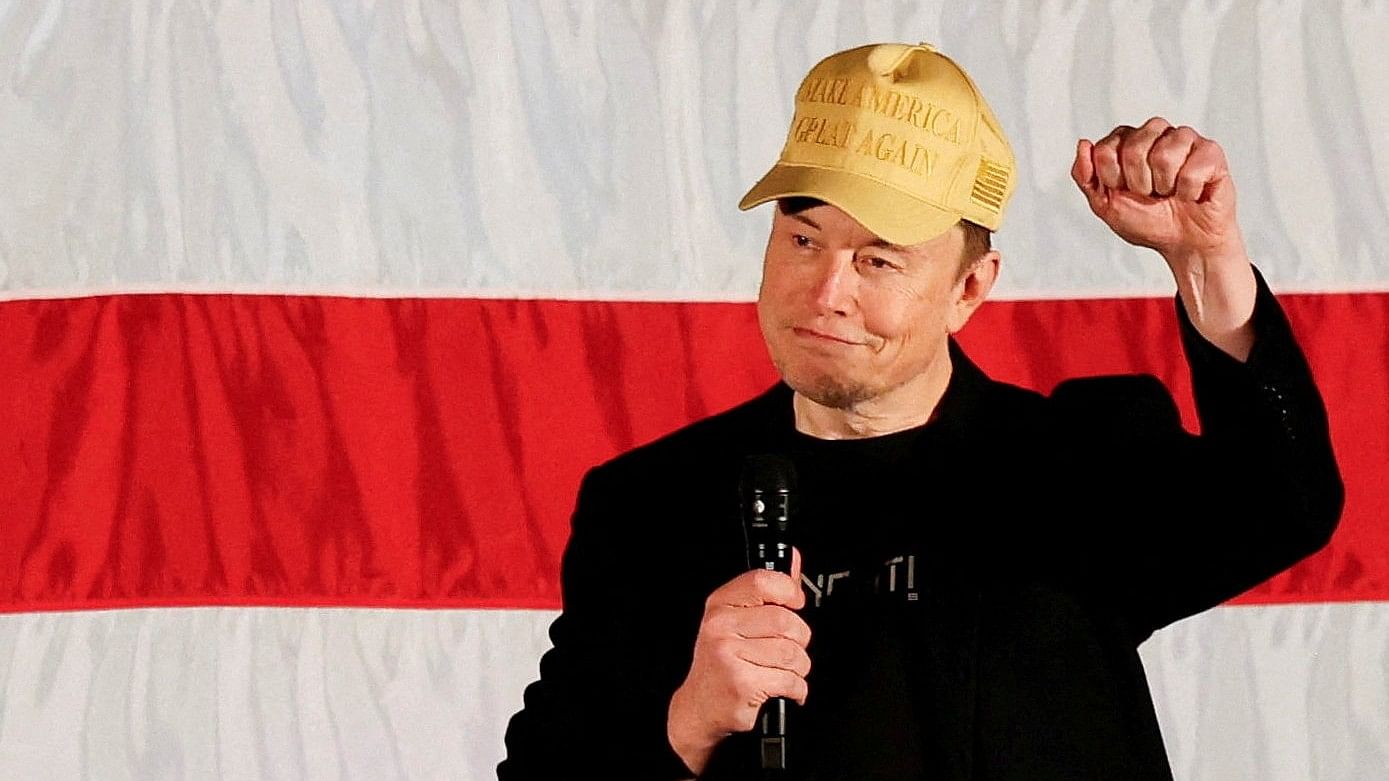 <div class="paragraphs"><p>Tesla CEO and X owner Elon Musk, who supports Republican presidential nominee former US President Donald Trump, gestures as he speaks about voting during an America PAC Town Hall in Folsom, Pennsylvania, US.</p></div>