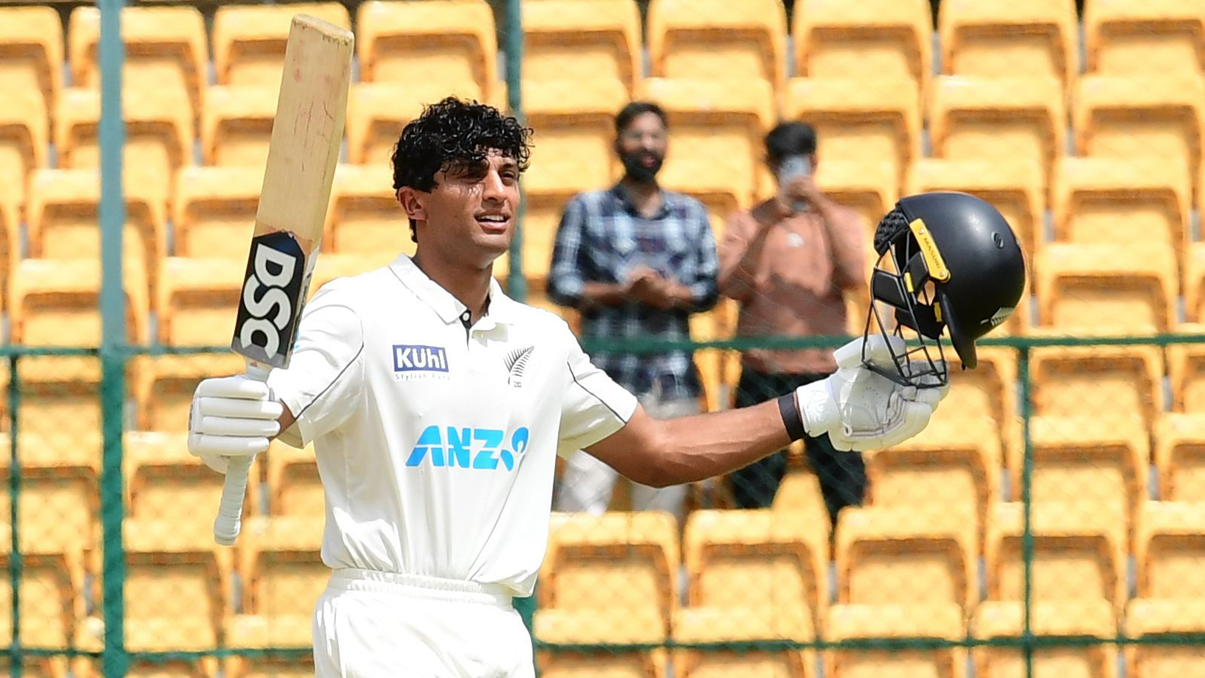 <div class="paragraphs"><p>New Zealand's Rachin Ravindra celebrates after completing his century on the third day of the first Test against India in Bengaluru.&nbsp;</p></div>