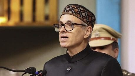 <div class="paragraphs"><p> Omar Abdullah taking oath as the Chief Minister of Jammu and Kashmir, in Srinagar. </p></div>