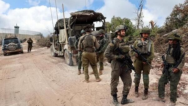 <div class="paragraphs"><p>Israeli soldiers operate during an incursion and amid hostilities between Hezbollah and Israel</p></div>