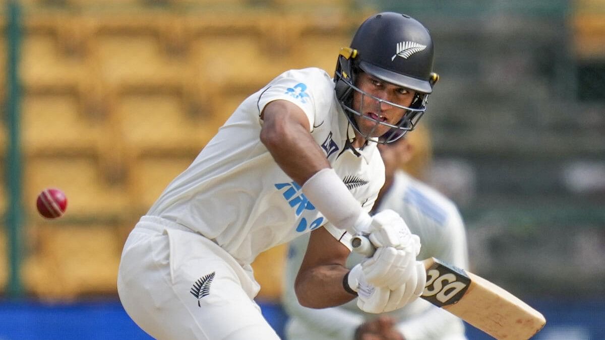 <div class="paragraphs"><p>New Zealand batter Rachin Ravindra plays a shot during the third day of the first cricket test match between India and New Zealand at M Chinnaswamy Stadium, in Bengaluru, Karnataka, Friday, October 18, 2024.</p></div>