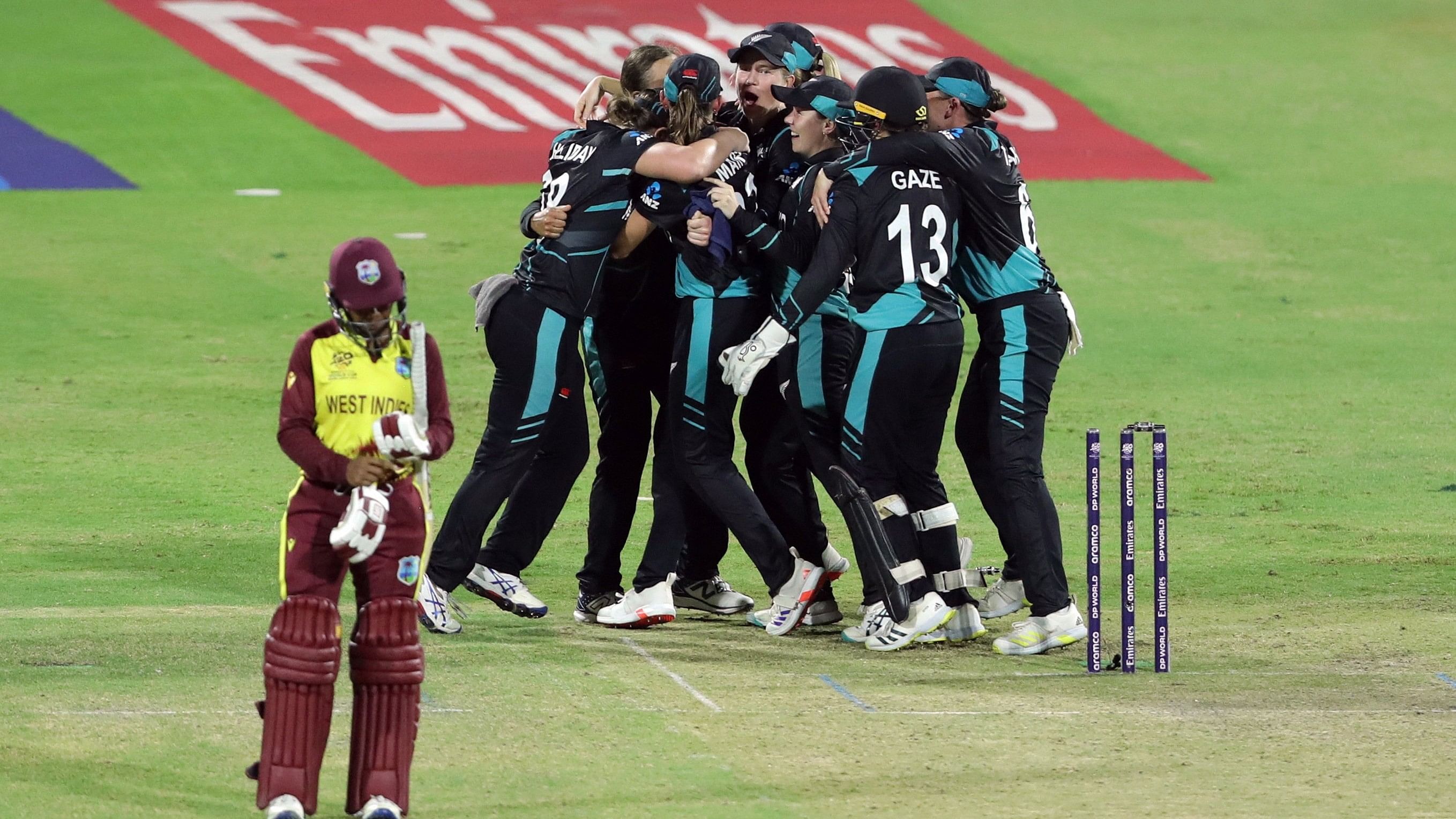 <div class="paragraphs"><p>New Zealand players celebrate after winning the match.</p></div>