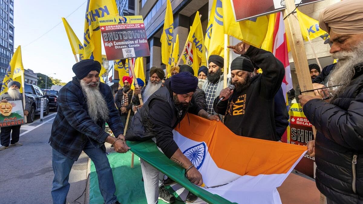 <div class="paragraphs"><p>Sikh protesters picket outside the Consulate General of India.</p></div>