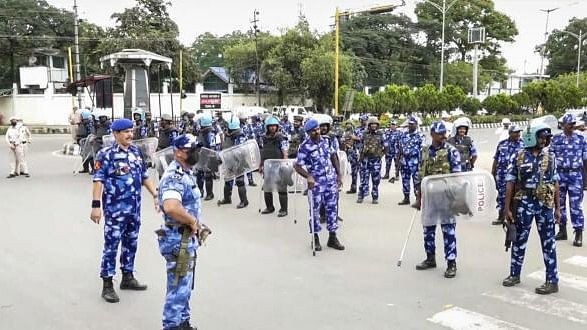 <div class="paragraphs"><p>Security personnel keep vigil during a protest march by members of All Manipur Students' Union (AMSU) against the recent violence in the state, in Imphal. (Image for representation)</p></div>