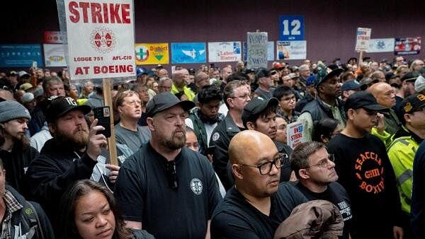 <div class="paragraphs"><p>Boeing workers from the International Association of Machinists and Aerospace Workers District 751 attend a rally at their union hall during an ongoing strike in Seattle, Washington, US, October 15, 2024. </p></div>