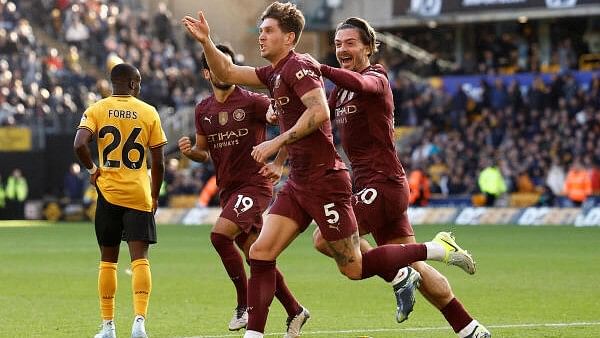 <div class="paragraphs"><p>Manchester City's John Stones celebrates scoring their second goal with Jack Grealish.</p></div>