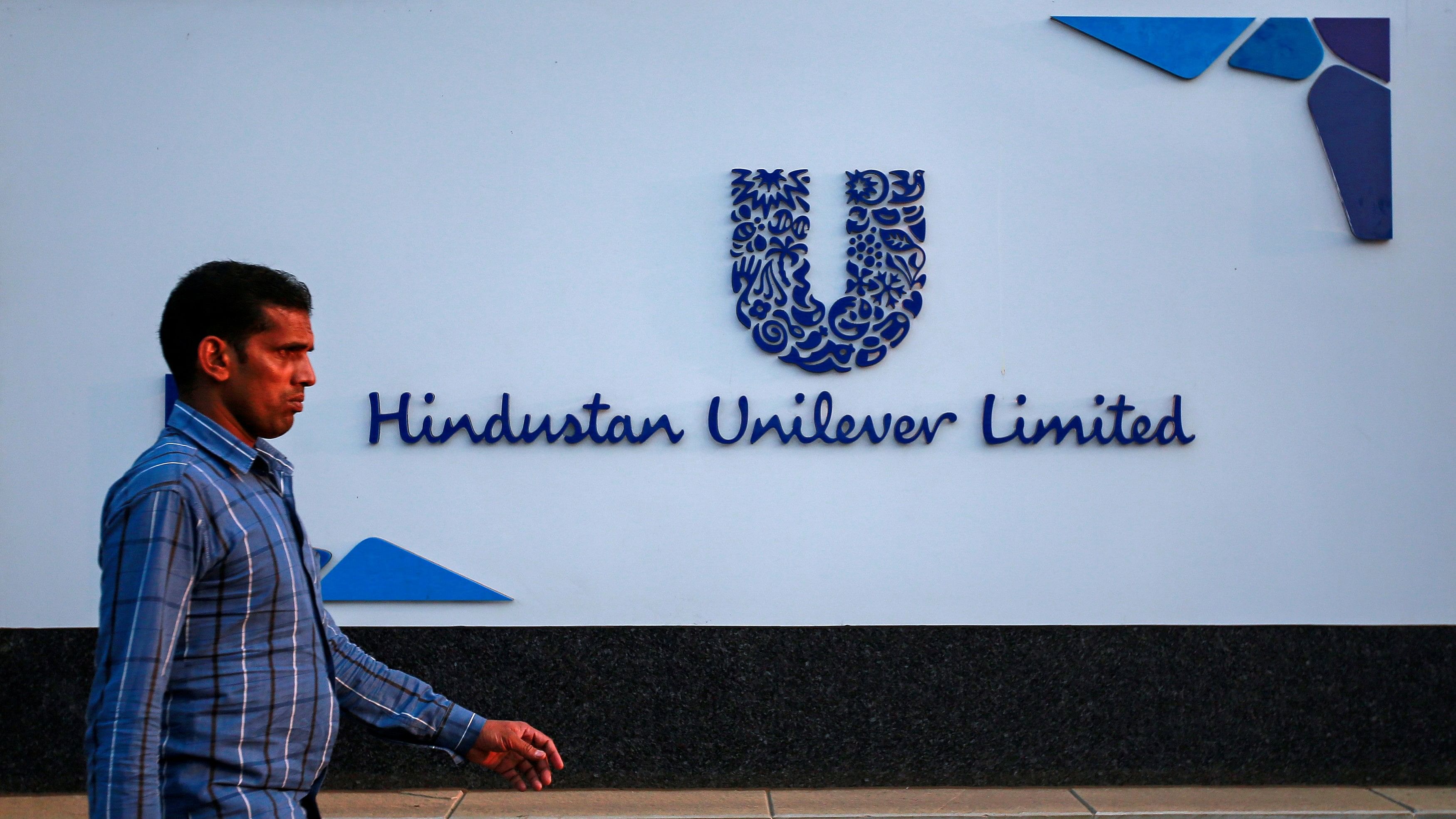 <div class="paragraphs"><p> A pedestrian walks past the Hindustan Unilever Limited (HUL) headquarters in Mumbai.</p></div>