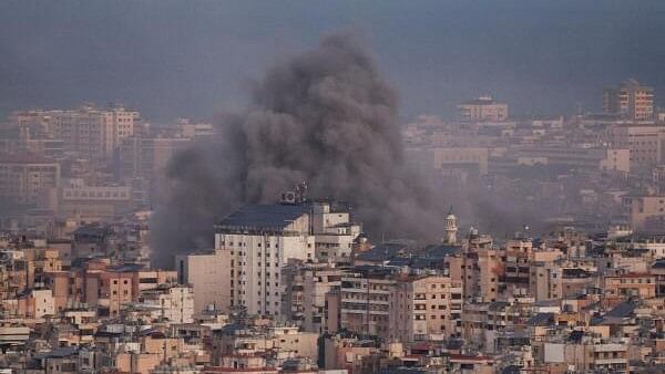 <div class="paragraphs"><p>Smoke billows over Beirut's southern suburbs after an Israeli strike, amid the ongoing hostilities between Hezbollah and Israeli forces, as seen from Hadath, Lebanon.&nbsp;</p></div>