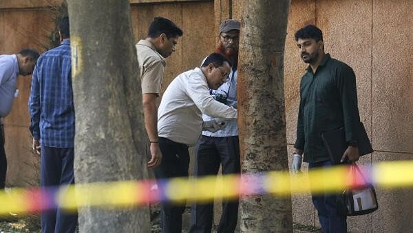 <div class="paragraphs"><p>Forensic expert collects samples from the site after a blast was reported at Prashant Vihar, near CRPF school in Rohini area of New Delhi, Sunday, Oct 20, 2024.</p></div>