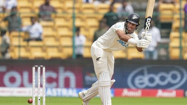 <div class="paragraphs"><p>New Zealand's Rachin Ravindra plays a shot during the fifth day of the first test cricket match between India and New Zealand at M Chinnaswamy Stadium, in Bengaluru.&nbsp;</p></div>