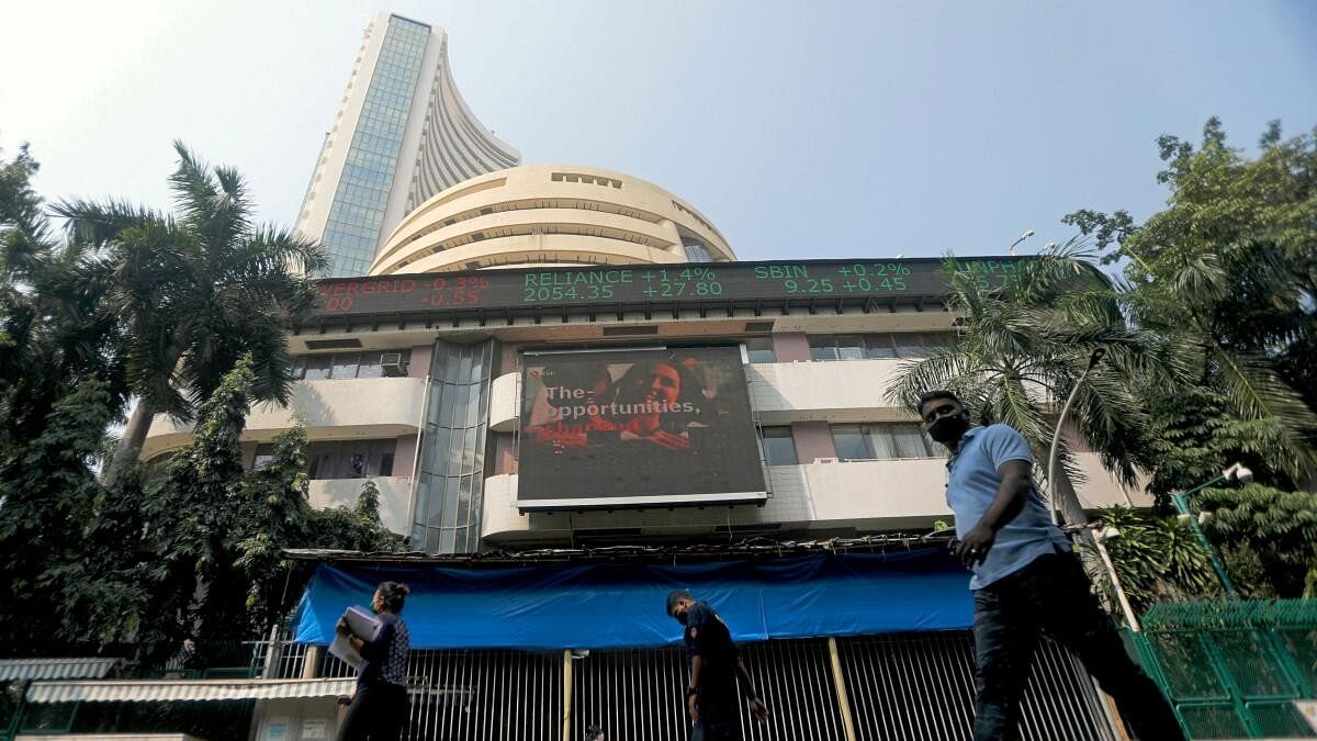 <div class="paragraphs"><p>People walk past the Bombay Stock Exchange (BSE) building in Mumbai.</p></div>