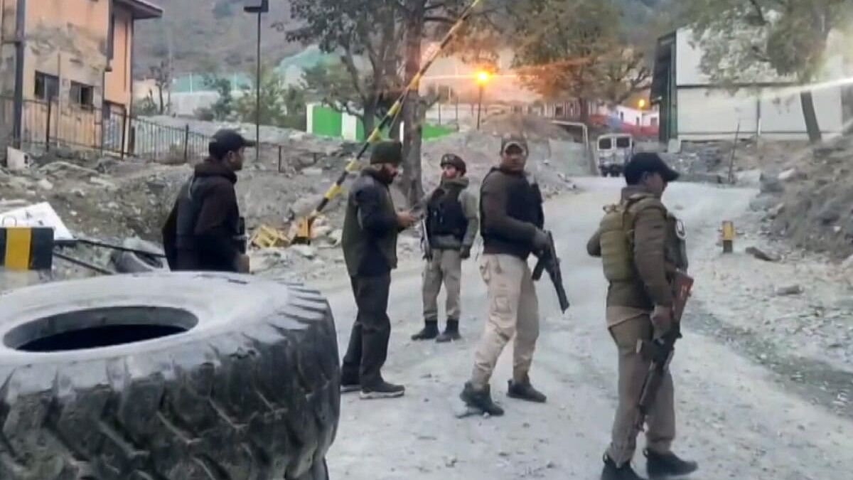 <div class="paragraphs"><p>Security personnel cordon off the area after a terrorist attack, in Ganderbal district, Jammu &amp; Kashmir.</p></div>