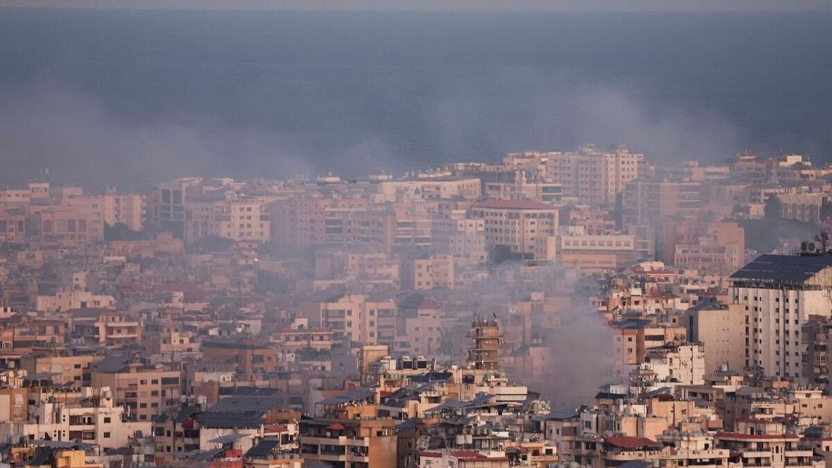 <div class="paragraphs"><p>Smoke billows over Beirut's southern suburbs after an Israeli strike, amid the ongoing hostilities between Hezbollah and Israeli forces, as seen from Baabda, Lebanon.</p></div>