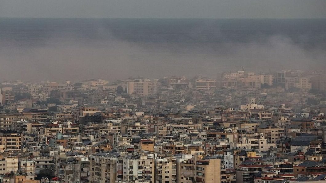 <div class="paragraphs"><p>Smoke billows over Beirut's southern suburbs after an Israeli strike, amid the ongoing hostilities between Hezbollah and Israeli forces.</p></div>