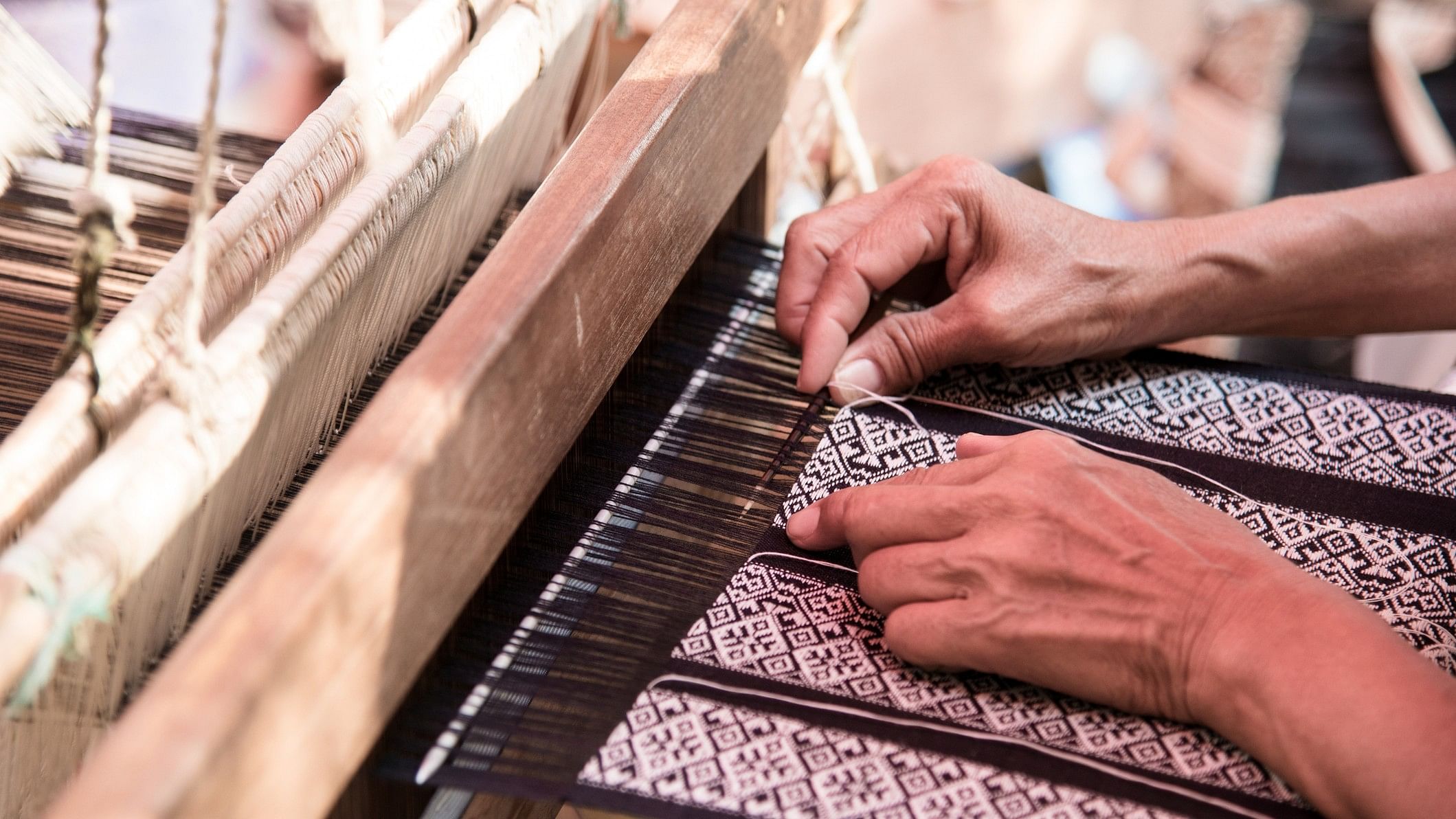 <div class="paragraphs"><p>Representative image showing a carpet weaver</p></div>