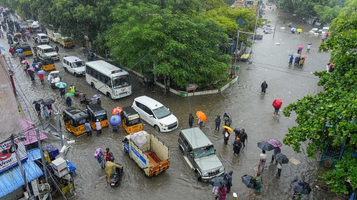 <div class="paragraphs"><p>Vehicles ply on waterlogged roads amid rains in Chennai recently.&nbsp;</p></div>