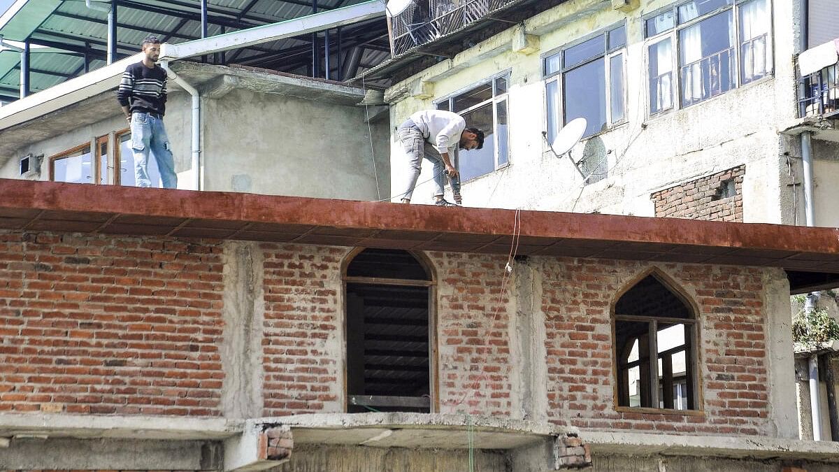 <div class="paragraphs"><p>Workers start demolishing the illegal portion of the Sanjauli mosque in Shimla.</p></div>