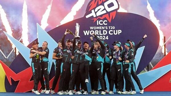 <div class="paragraphs"><p>New Zealand's Sophie Devine lifts the trophy as she celebrates with teammates after winning the Women's Cricket T20 World Cup.&nbsp;</p></div>