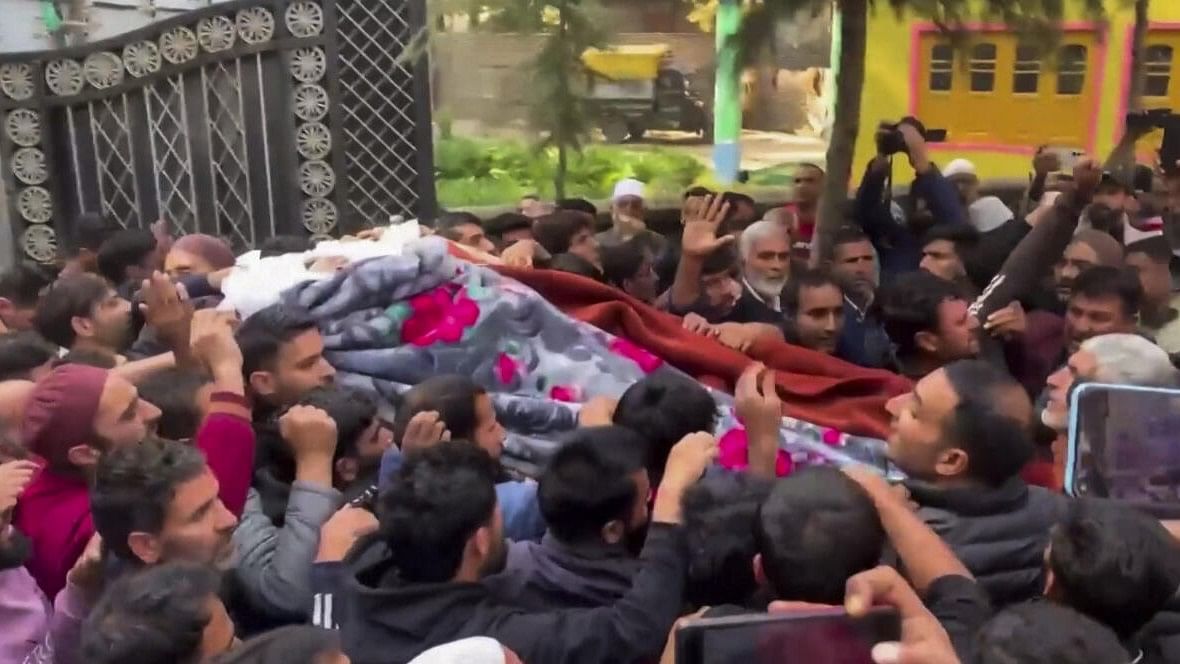 <div class="paragraphs"><p>Mortal remains of doctor Shahnawaz, who was killed in a terrorist attack in J&amp;K's Ganderbal on Sunday, being brought to his residence, at Naidgam in Budgam district, Jammu &amp; Kashmir, Monday, Oct. 21, 2024.</p></div>