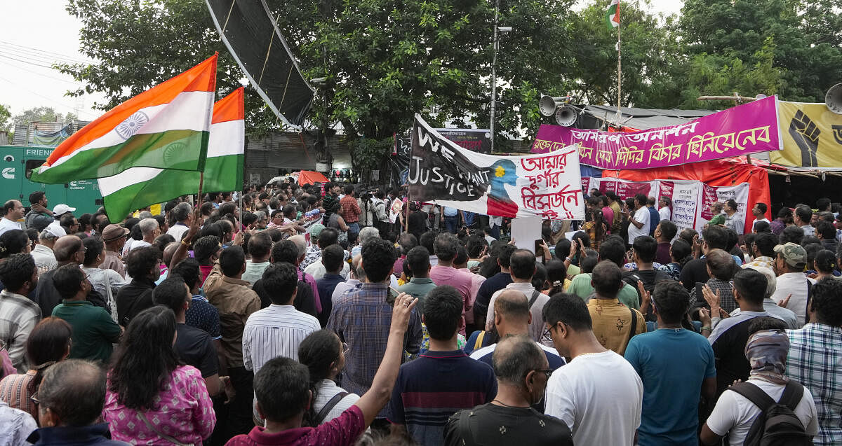 <div class="paragraphs"><p>People gather near the fasting mancha of junior doctors observing fast-unto-death in protest against the alleged rape and murder of their colleague at the RG Kar Medical College and Hospital, in Kolkata, Sunday, Oct. 20, 2024. The agitating doctors said they will attend a meeting called by the West Bengal government on Monday to resolve issues related to their demands, emphasising that its outcome will determine whether they will withdraw their indefinite hunger strike. </p></div>