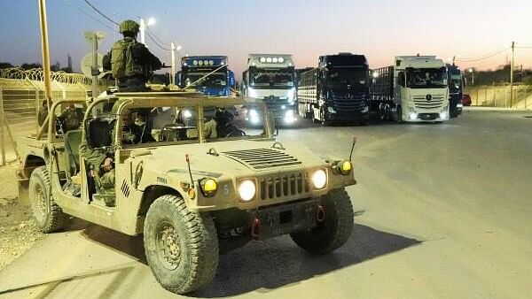 <div class="paragraphs"><p>Israeli soldiers sit in a military vehicle</p></div>