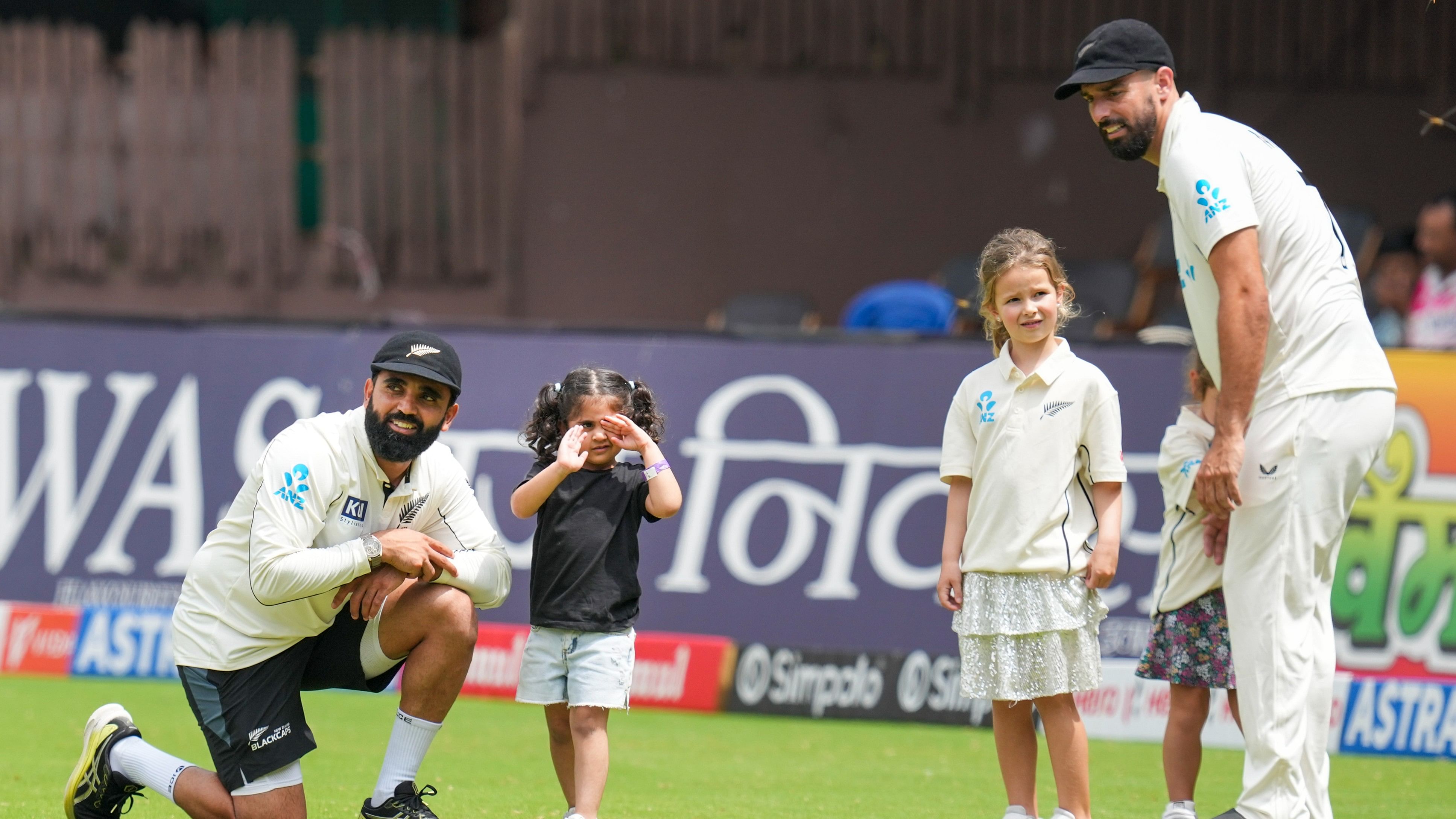 <div class="paragraphs"><p>New Zealand's Ajaz Patel and Daryl Mitchell with their children during the presentation ceremony.</p></div>