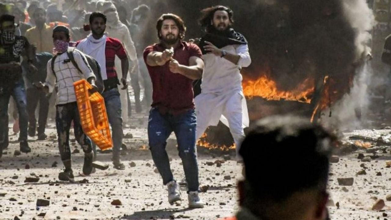 <div class="paragraphs"><p>Shahrukh Pathan brandishes a pistol during clashes between a group of anti-CAA protestors and supporters of the new citizenship act at Jafrabad in North-East Delhi. </p></div>