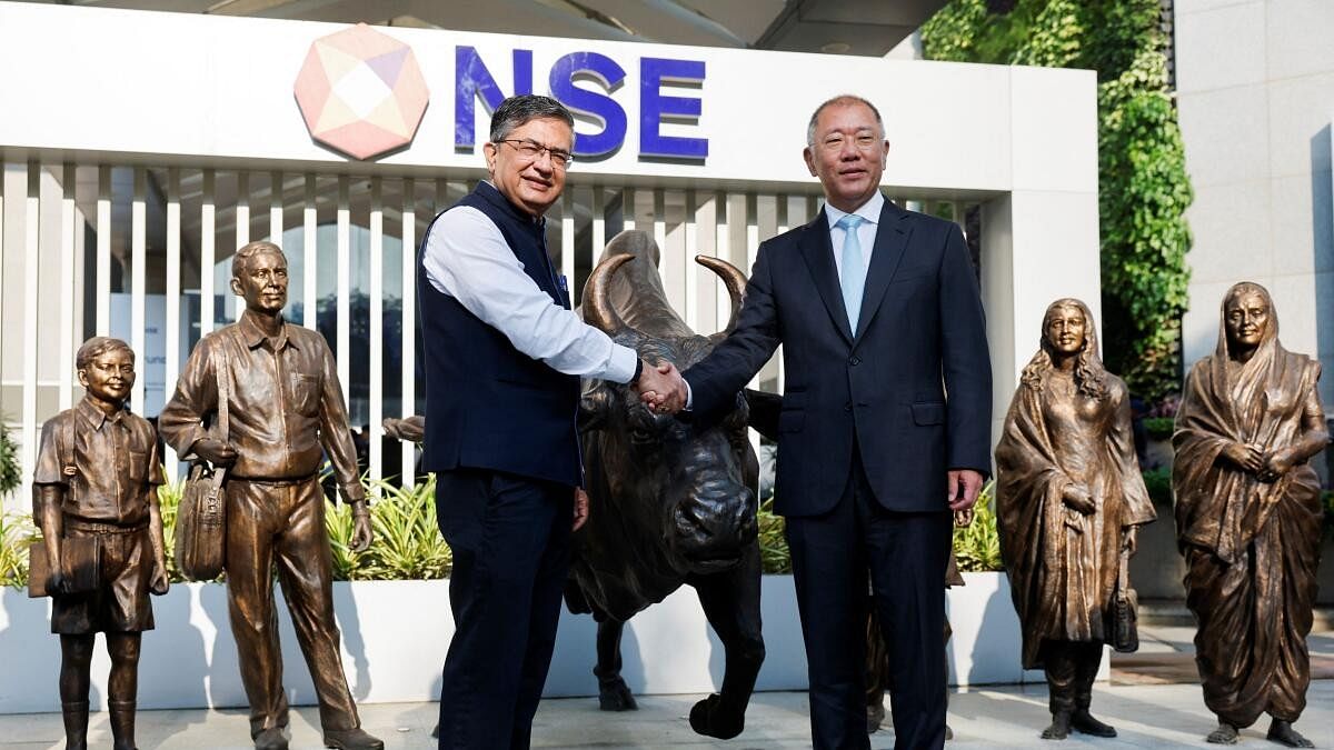 <div class="paragraphs"><p>Executive Chairman of Hyundai and Chief Executive Officer (CEO) of Hyundai Motor Group, and Ashishkumar Chauhan, Managing Director and Chief Executive Officer of the National Stock Exchange (NSE), pose for a picture during the listing ceremony of Hyundai Motor India Limited IPO at NSE, in Mumbai, India, October 22, 2024.</p></div>