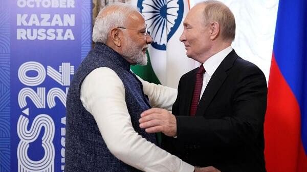 <div class="paragraphs"><p>Russian President Vladimir Putin embraces Indian Prime Minister Narendra Modi on the sidelines of the BRICS Summit in Kazan.</p></div>