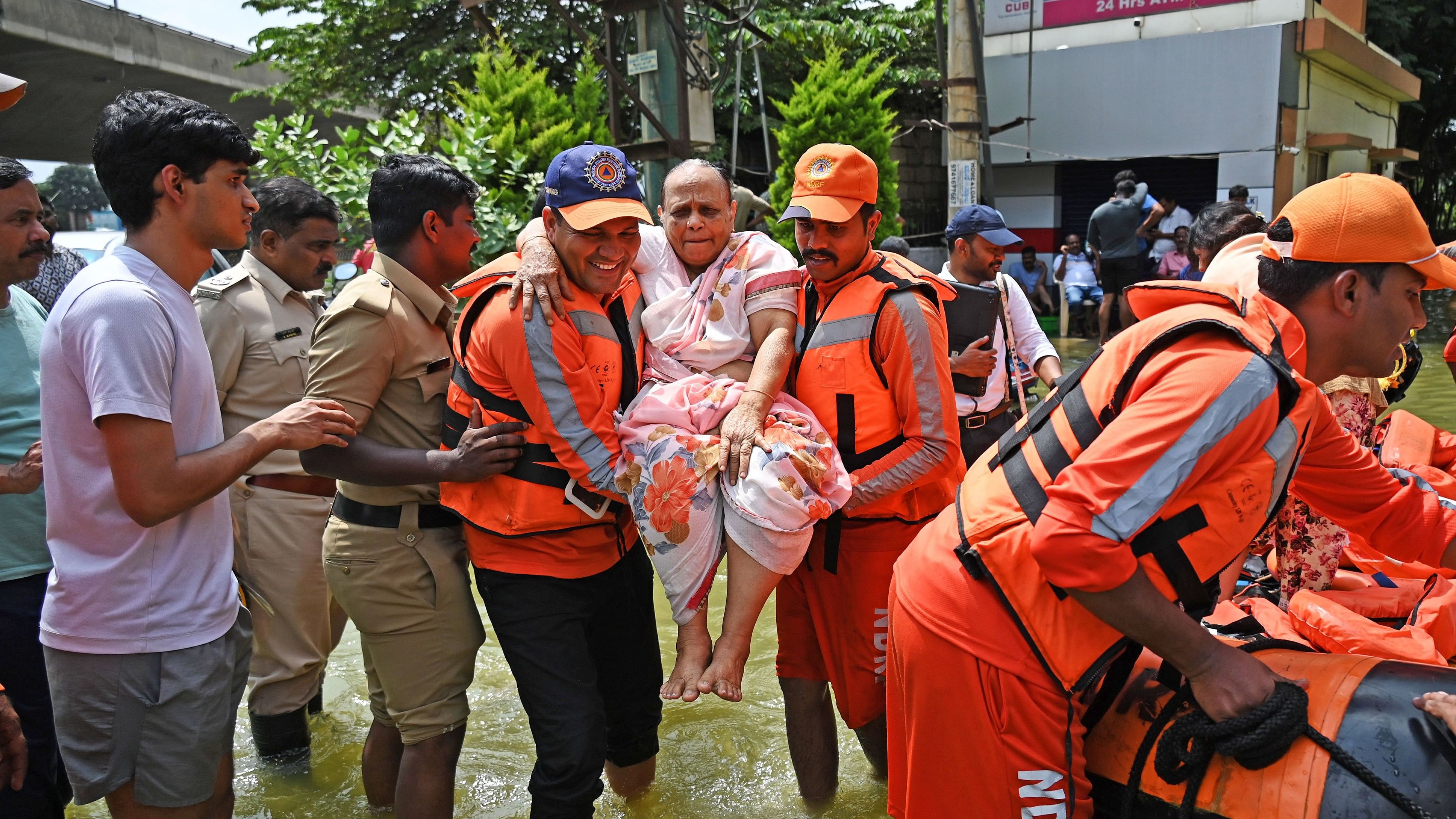 <div class="paragraphs"><p>NDRF personnel rescue residents from their apartments at Kendriya Vihar, Yelahanka. </p></div>