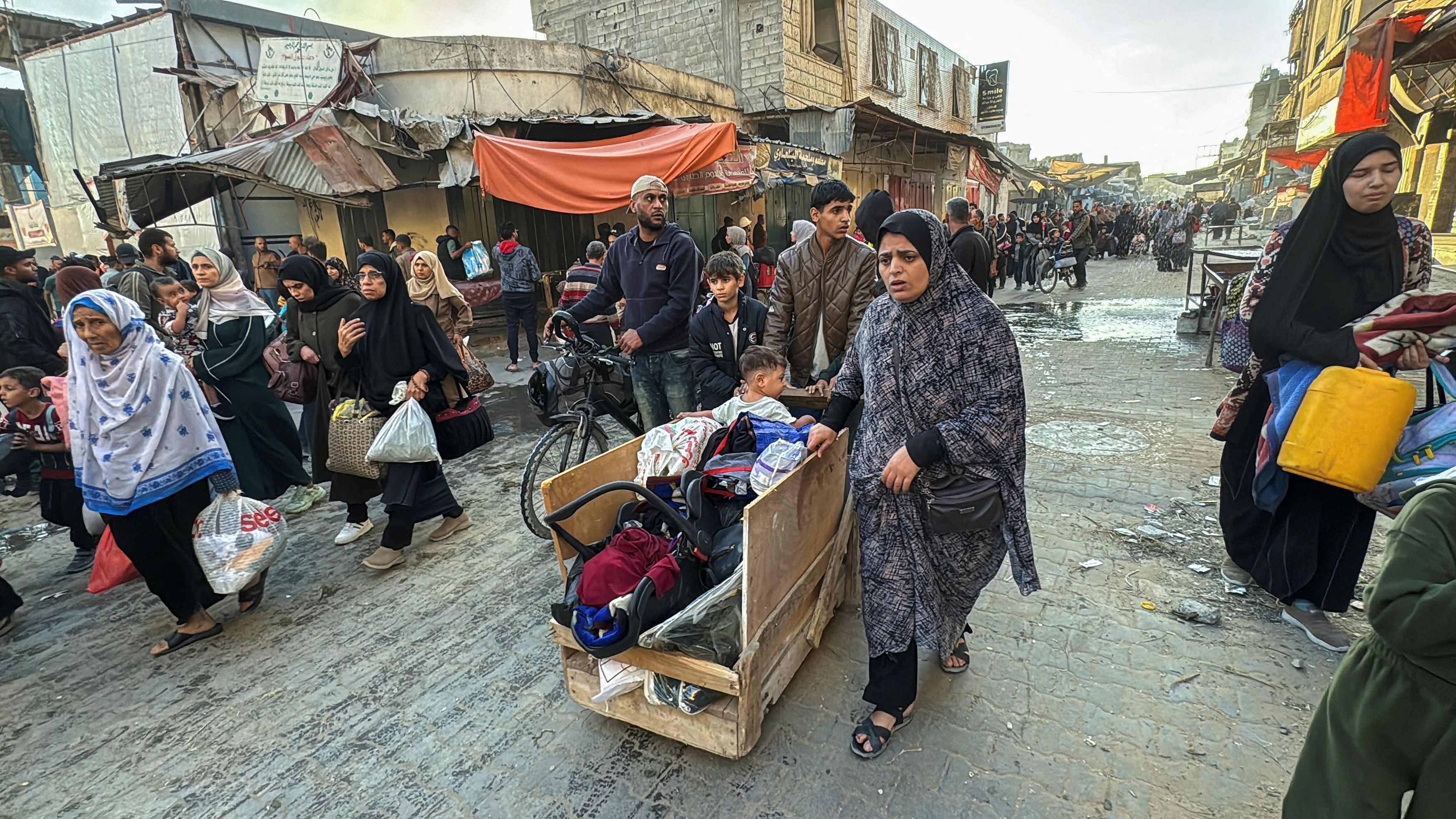 <div class="paragraphs"><p>Displaced Palestinians ordered by the Israeli military to evacuate their neighborhoods make their way as they flee amid an Israeli military operation, in Beit Lahiya in the northern Gaza Strip October 22, 2024.</p></div>