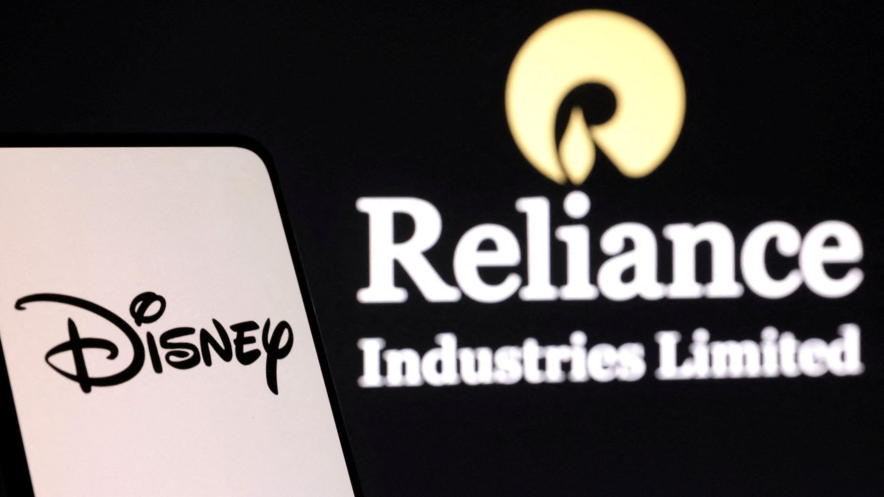 FILE PHOTO: Disney and Reliance logos are seen in this illustration taken, August 13, 2024. REUTERS/Dado Ruvic/Illustration/File Photo