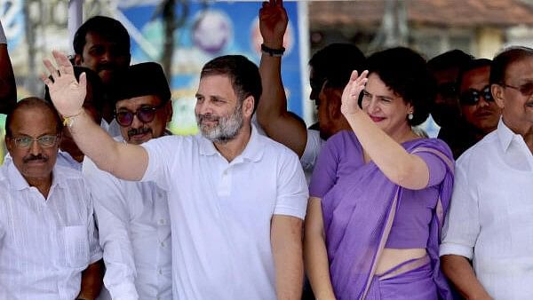 <div class="paragraphs"><p>Congress leader and Leader of Opposition in Lok Sabha Rahul Gandhi with party leader and candidate from Wayanad constituency Priyanka Gandhi Vadra during a roadshow before filing her nomination for the upcoming Lok Sabha bypoll, in Wayanad, Kerala.</p></div>