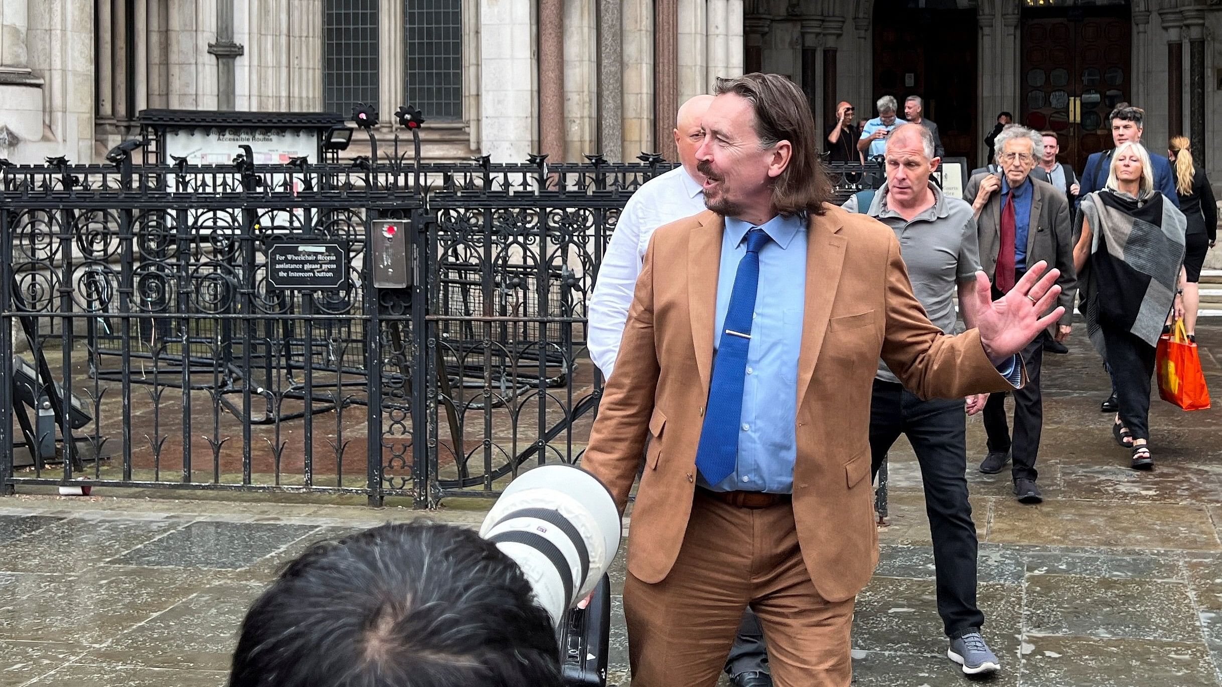 <div class="paragraphs"><p>Richard D. Hall leaves the Royal Courts of Justice after the trial of Manchester Arena bombing survivor Martin Hibbert’s lawsuit against him for alleged harassment, in London, Britain July 25, 2024.</p></div>