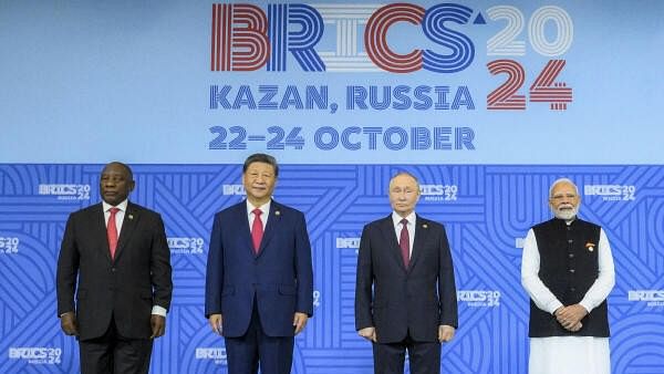 <div class="paragraphs"><p> South Africa's President Cyril Ramaphosa seen here with other world leaders&nbsp;Prime Minister Narendra Modi, China's President Xi Jinping and Russia's President Vladimir Putin during the 16th BRICS Summit, in Kazan, Russia, Wednesday, Oct. 23, 2024.</p></div>