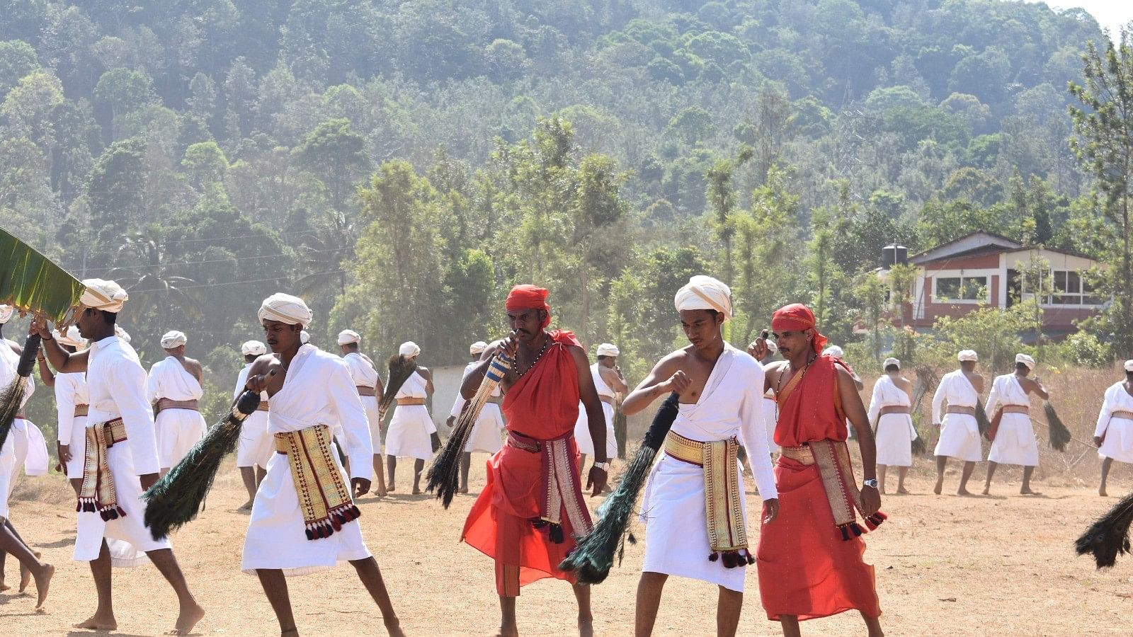 <div class="paragraphs"><p>Men perform 'chowri-aat', as part of the festival celebrations. </p></div>