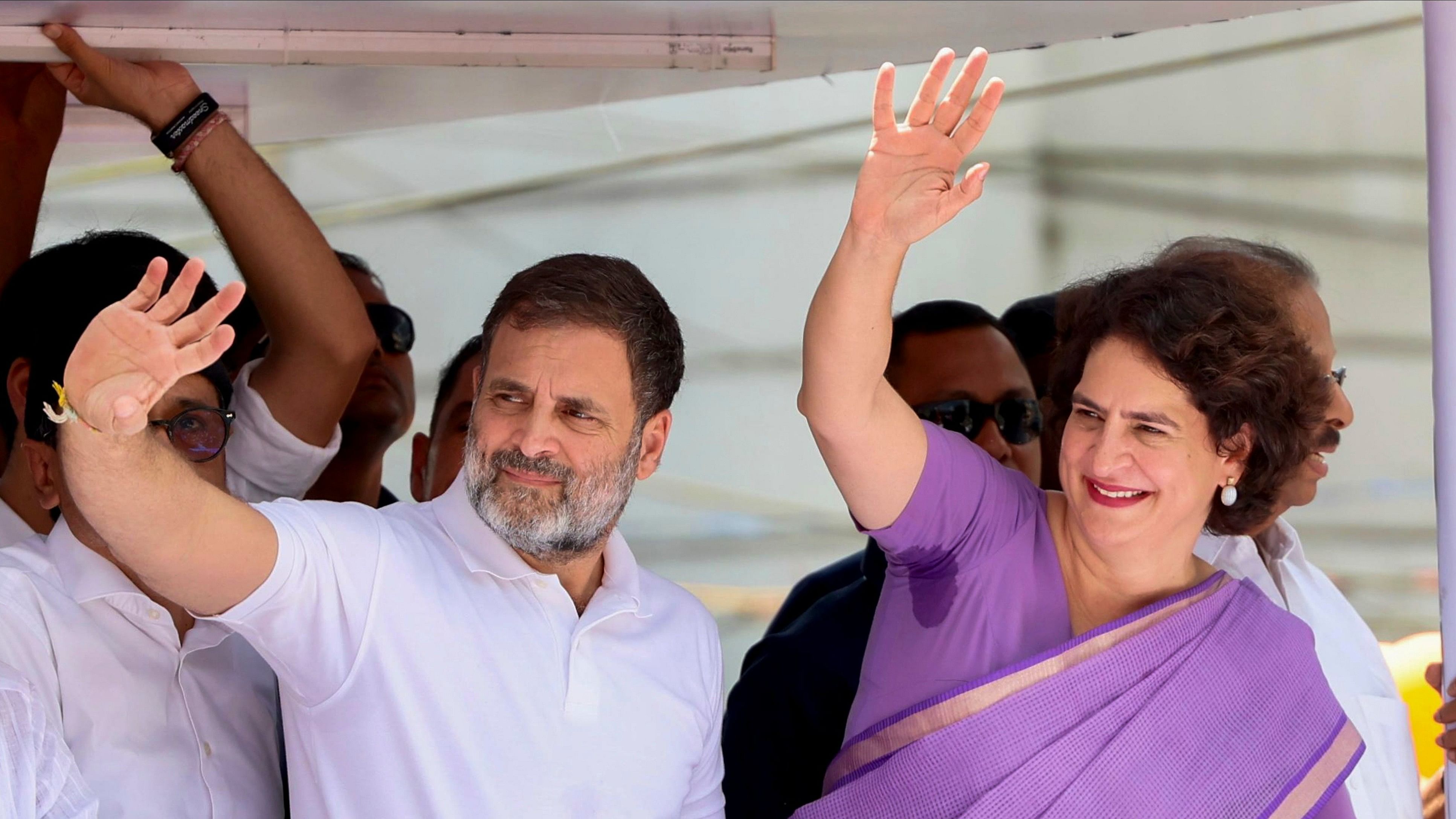 <div class="paragraphs"><p>Congress leader and Leader of Opposition in Lok Sabha Rahul Gandhi with party leader and candidate from Wayanad constituency Priyanka Gandhi Vadra during a roadshow before filing her nomination for the upcoming Lok Sabha bypoll, in Wayanad, Kerala, Wednesday, Oct. 23, 2024. </p></div>