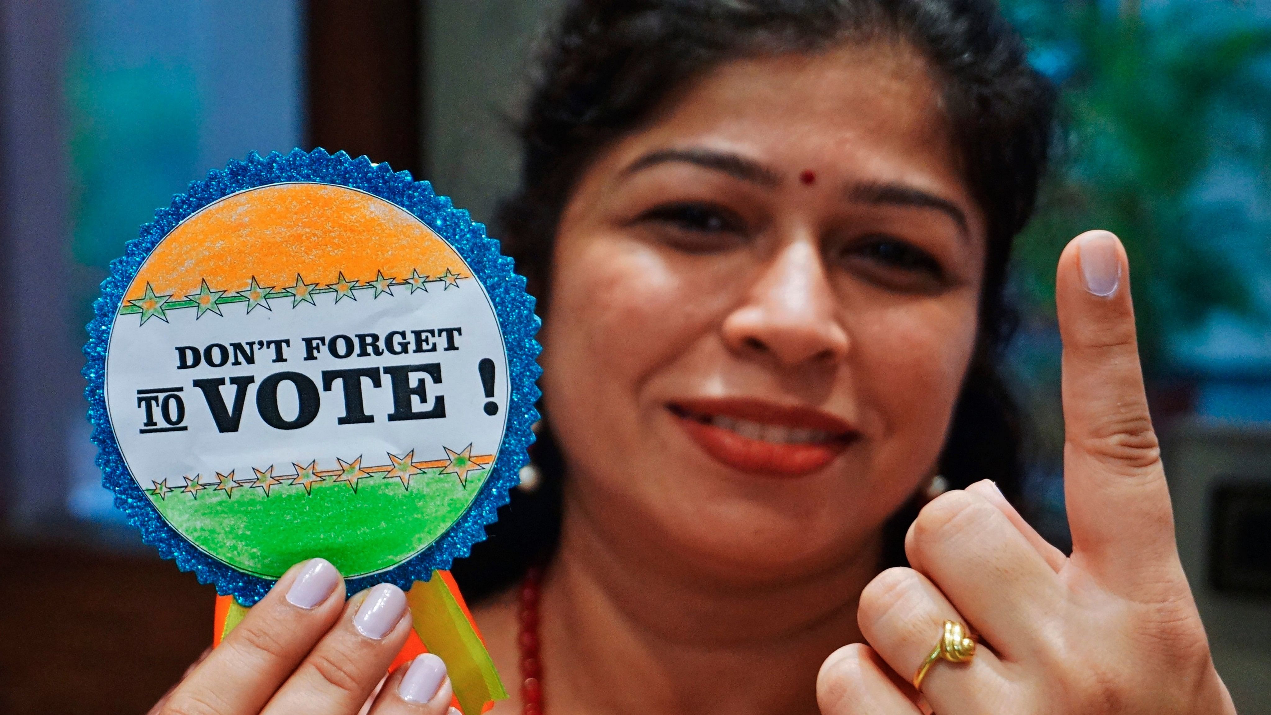 <div class="paragraphs"><p>A school teacher in Thane poses for photos as part of the voter awareness campaign. Representative image.&nbsp;</p></div>