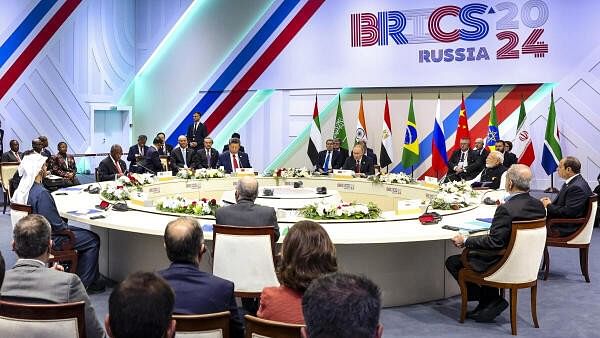 <div class="paragraphs"><p>Prime Minister Narendra Modi with Russia's President Vladimir Putin, China's President Xi Jinping and other world leaders during a plenary session of the 16th BRICS Summit, in Kazan, Russia, Wednesday, Oct. 23, 2024. </p></div>