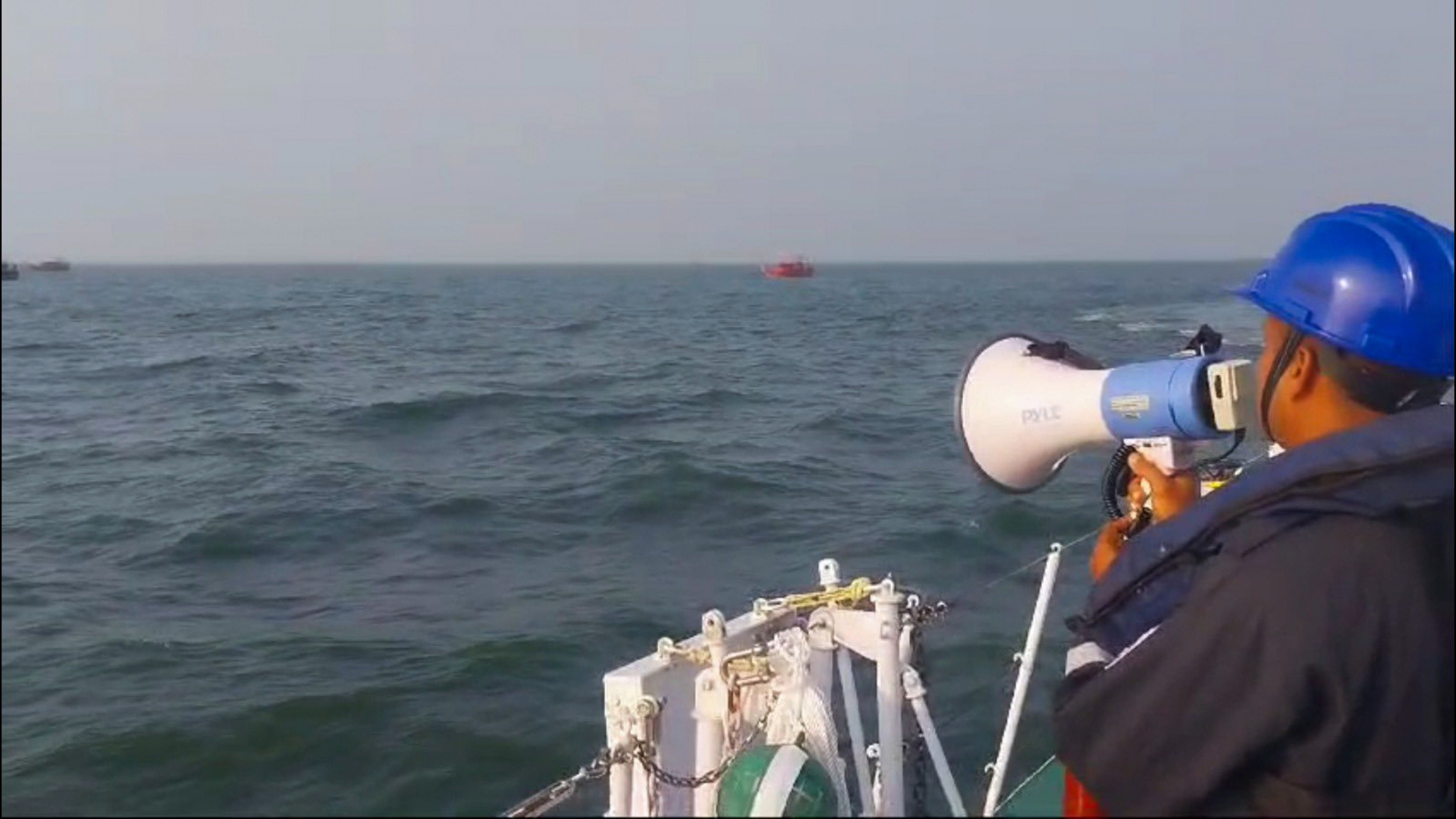 <div class="paragraphs"><p>An Indian Coast Guard official during preparations ahead of the landfall of Cyclone Dana.</p></div>