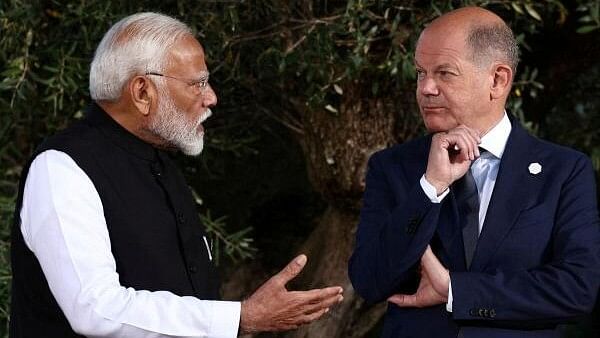 <div class="paragraphs"><p>Narendra Modi (left) with Germany's Olaf Scholz</p></div>