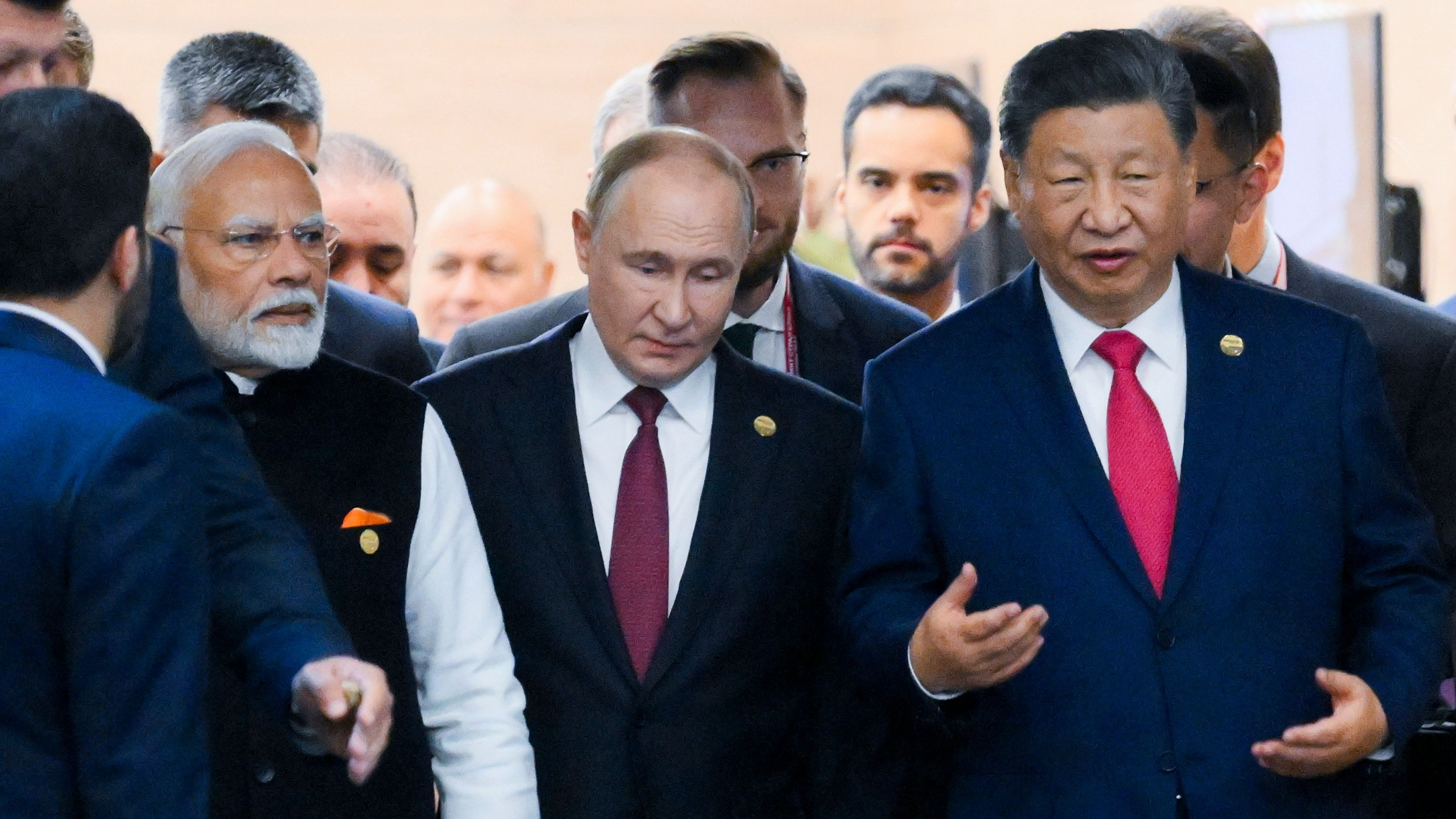 <div class="paragraphs"><p>Prime Minister Narendra Modi with Russia's President Vladimir Putin and China's President Xi Jinping during the 16th BRICS Summit, in Kazan, Russia, Wednesday.</p></div>