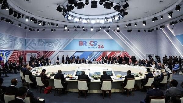 <div class="paragraphs"><p>Officials attend a plenary session of the BRICS 2024 summit in Kazan, Russia October 23, 2024.</p></div>