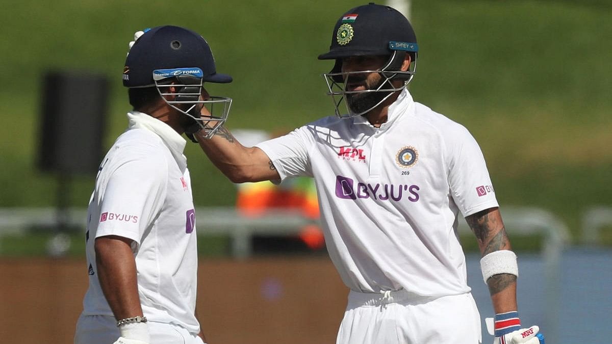 <div class="paragraphs"><p>Virat Kohli with Rishabh Pant during a Test match.&nbsp;</p></div>