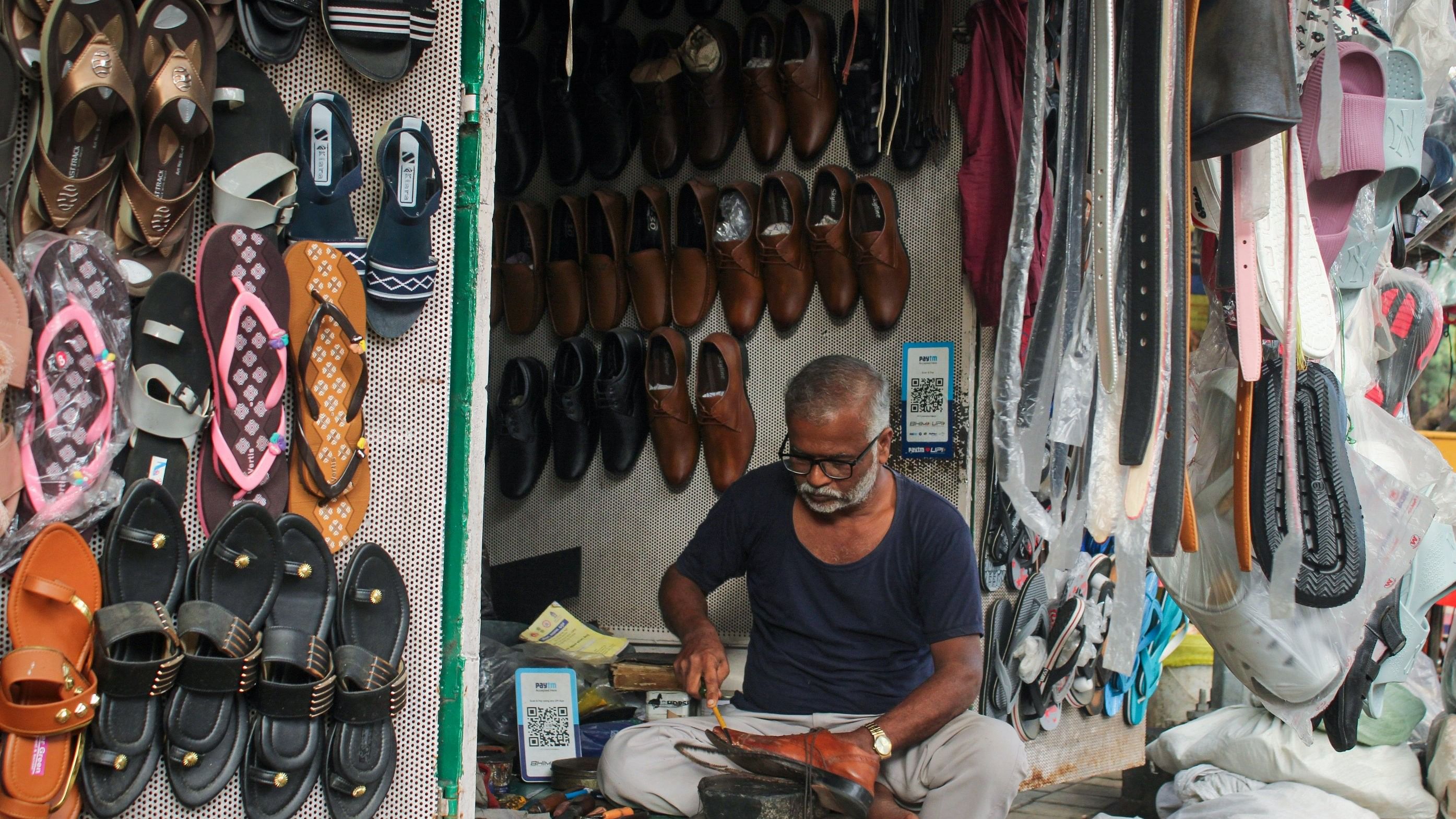 <div class="paragraphs"><p>A cobbler at work in Bengaluru. </p></div>