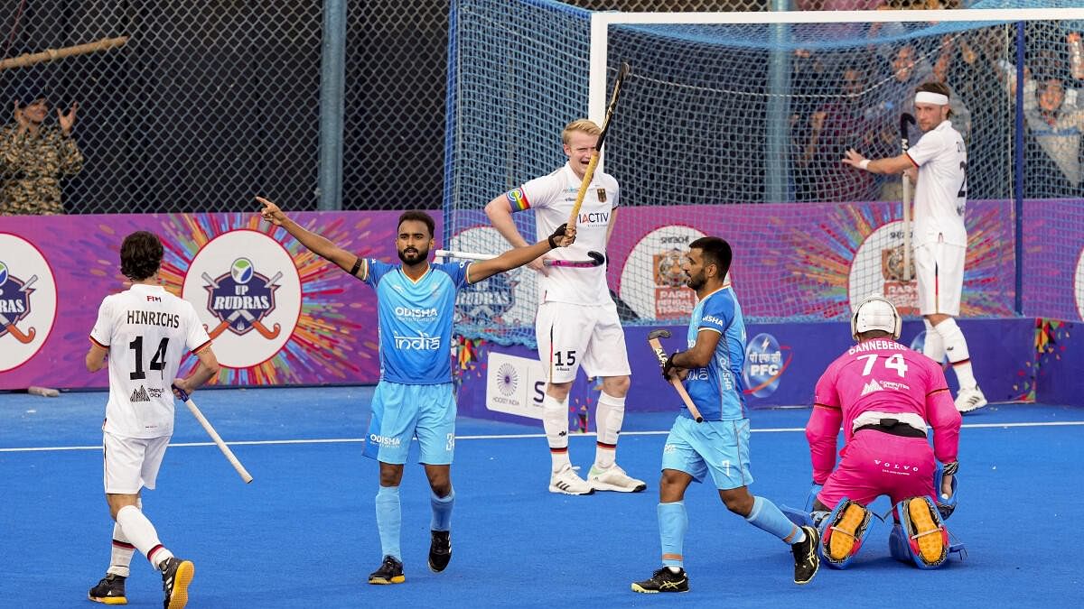 <div class="paragraphs"><p>India's Sukhjeet Singh with teammate celebrates after India scored a goal during the second men's hockey match of a two-match series between India and Germany, at the Major Dhyan Chand National Stadium, in New Delhi, Thursday, Oct. 24, 2024.</p></div>