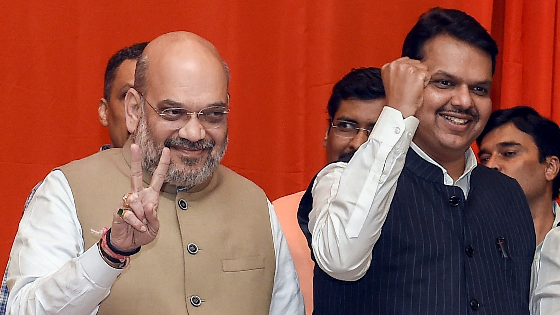 <div class="paragraphs"><p>BJP President Amit Shah flanked by  Maharashtra Chief Minister Devendra Fadnavis during the announcement of an alliance between Shiv Sena and BJP for Lok Sabha and Assembly polls, in Mumbai, Monday, Feb 18, 2019.</p></div>